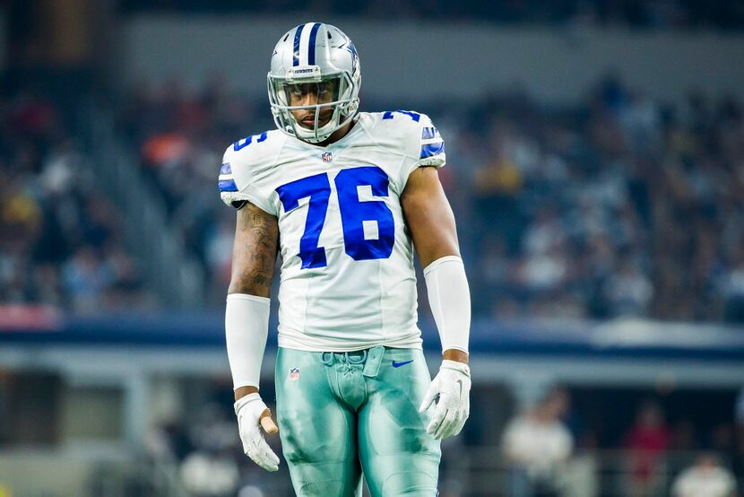 Dallas Cowboys defensive end Greg Hardy waits between plays during the second quarter of an...