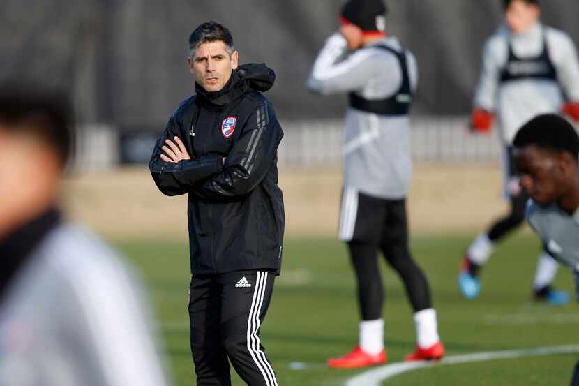 FC Dallas head coach Luchi Gonzalez looks on during the first day of training camp at Toyota...