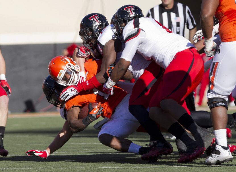 Nov 17, 2012; Stillwater OK, USA; Oklahoma State Cowboys running back Joseph Randle (1) runs...