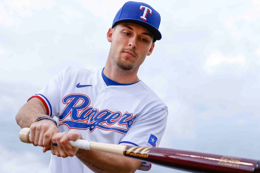 Texas Rangers outfielder Evan Carter is pictured during photo day at the team's training...