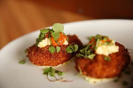 Fried green tomatoes are one of the best-sellers on the Tupelo Honey menu, a company exec...