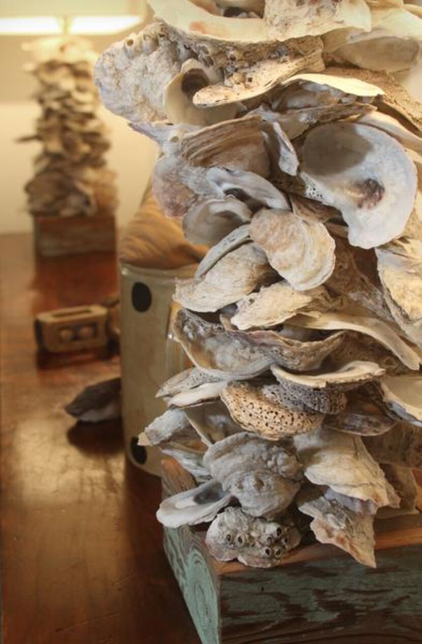 
A pair of lamps made out of oyster shells in Williams’ dining room
