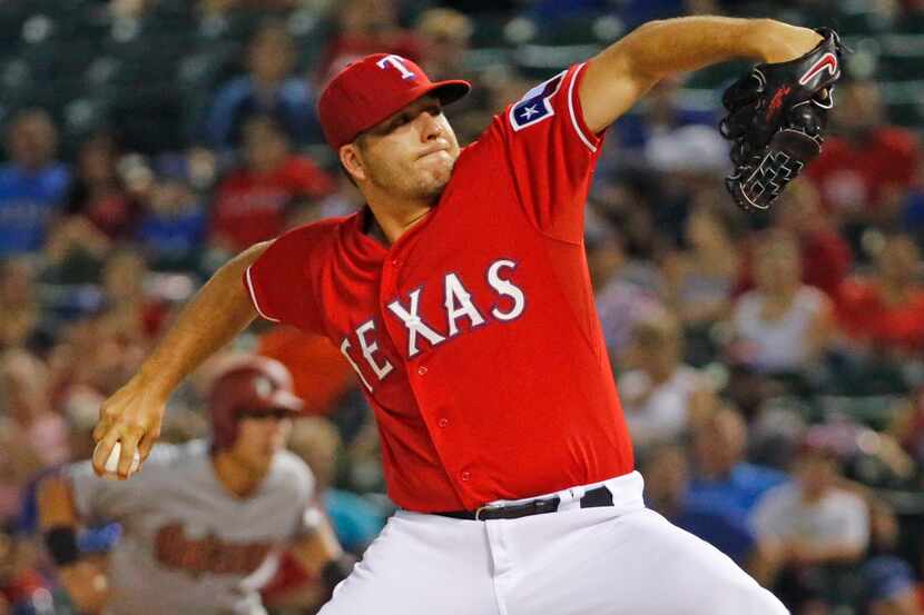 Texas Rangers relief pitcher Shawn Tolleson (37) throws a ninth-inning pitch during the...