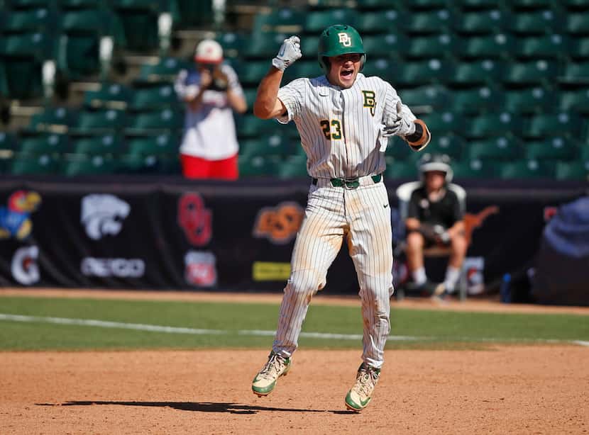 Baylor catcher Shea Langeliers (23) celebrates after hitting in the game winning run against...
