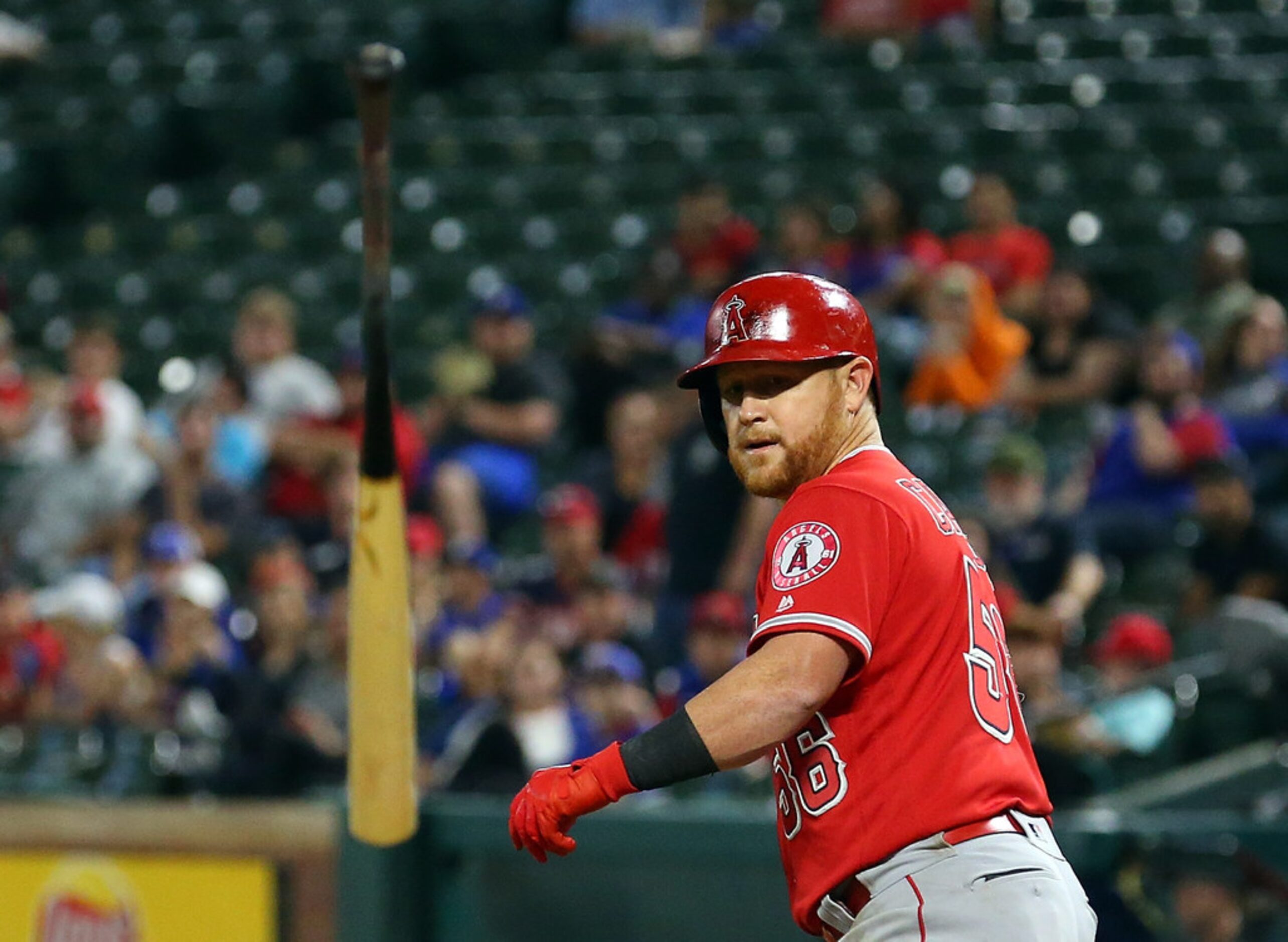 ARLINGTON, TEXAS - APRIL 17: Kole Calhoun #56 of the Los Angeles Angels tossed his bat after...