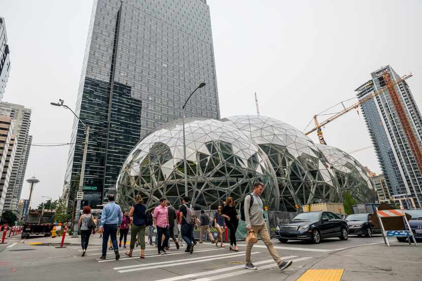 Pedestrians walked past geodesic domes at Amazon's Seattle headquarters in 2017.