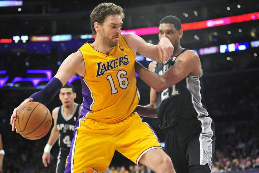March 19, 2014; Los Angeles, CA, USA; Los Angeles Lakers center Pau Gasol (16) moves to the...