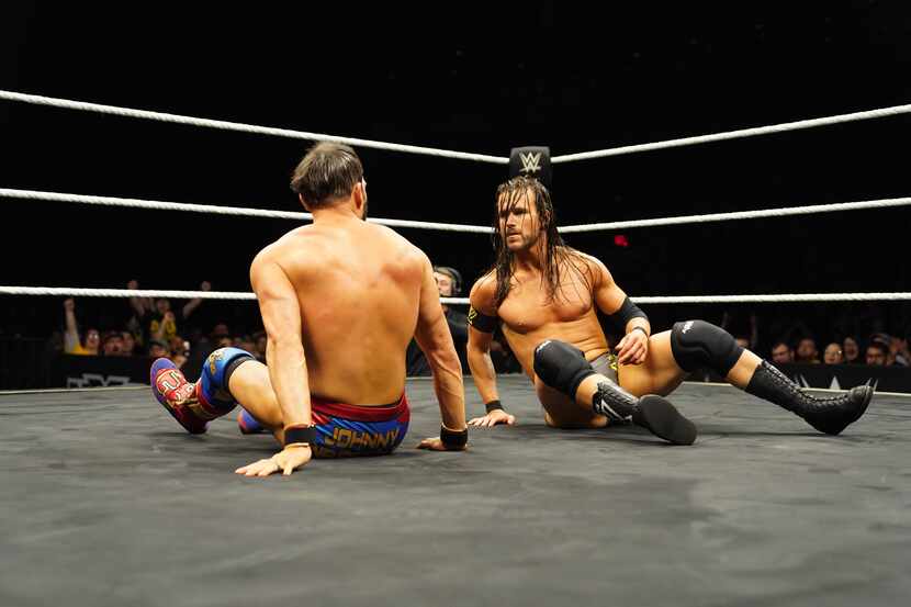 Adam Cole and Johnny Gargano stare each other down during their NXT championship match at...