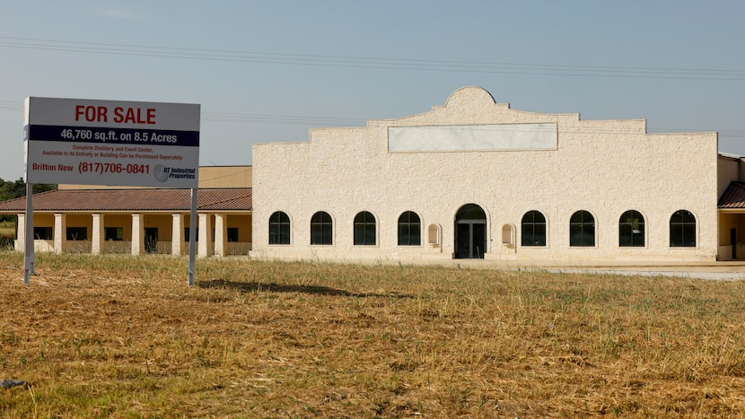 A for sale sign sits in front of the Whiskey Hollow building that Les Beasley envisioned...