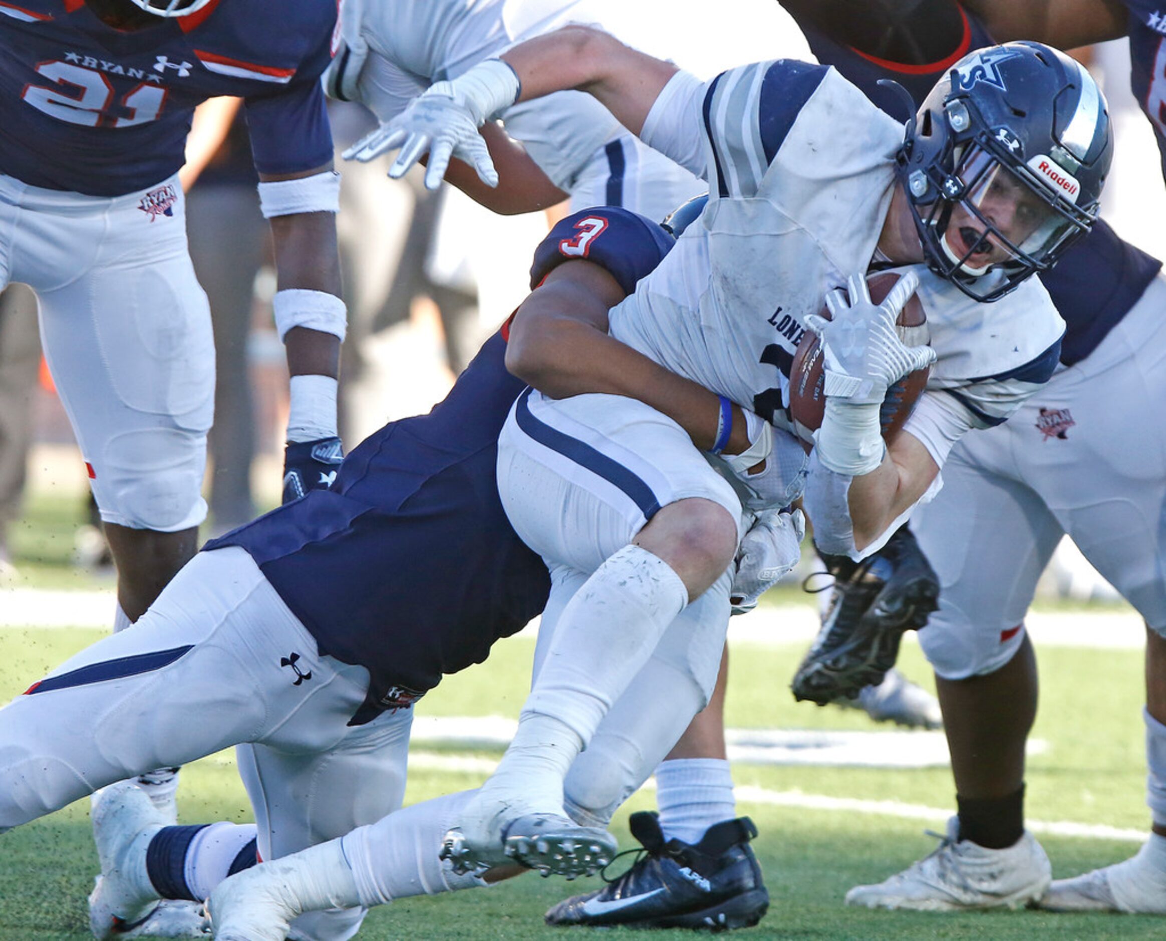 Lone Star High School running back Jake Bogdon (2) carries the football during the second...