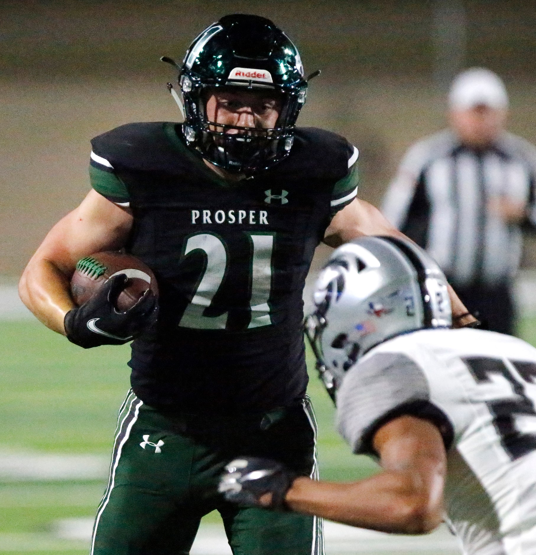 Denton Guyer High School defensive back Peyton Bowen (22)  attempts to tackle Prosper High...