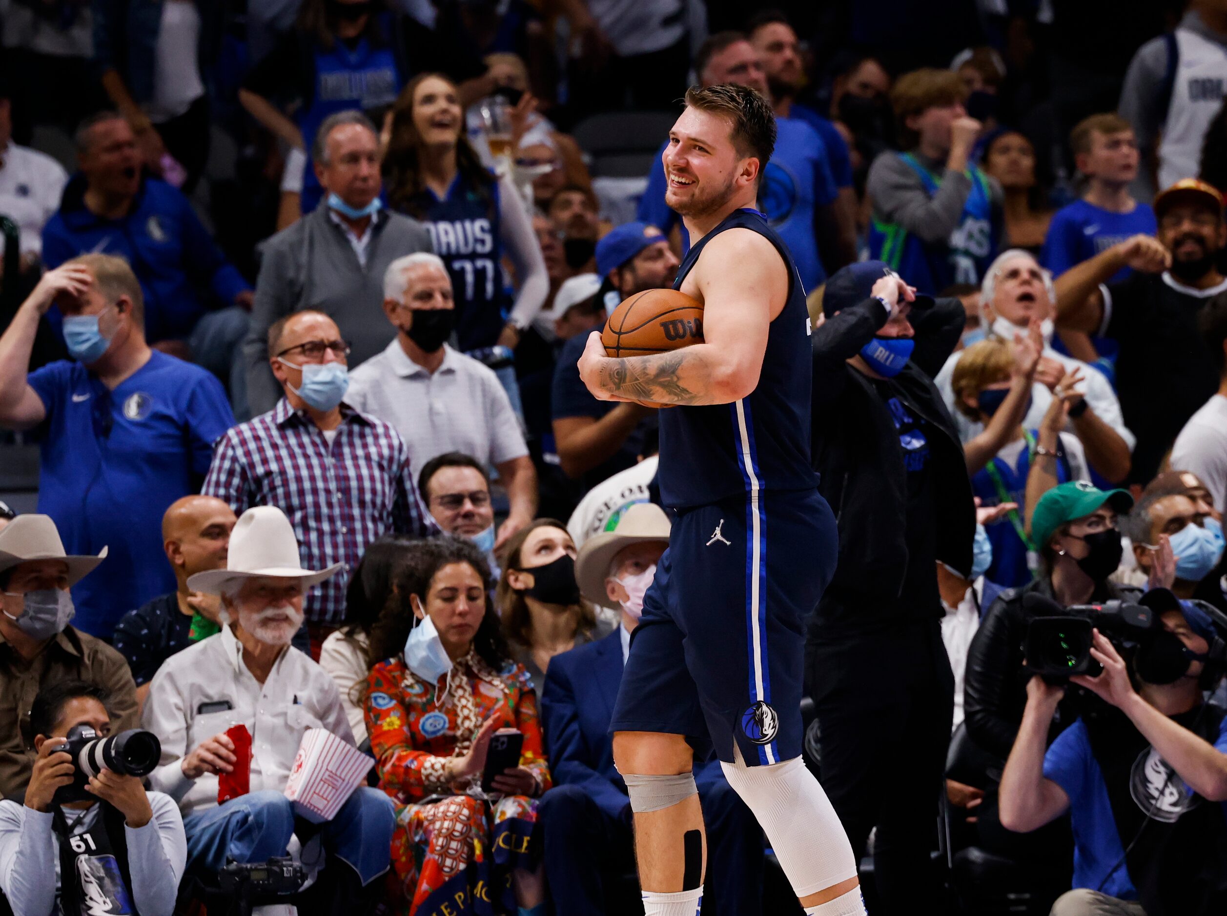 Dallas Mavericks guard Luka Dončić (77) smiles during the fourth quarter of the Dallas...