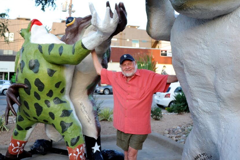 Original artist of the Six Frogs Over Tango, Bob "Daddy-O" Wade, stands next to the freshly...