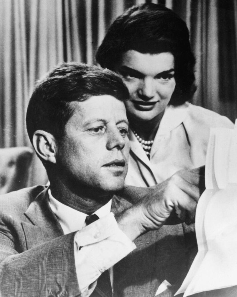 This file photo from the 1950s shows John F. Kennedy with his wife, Jacqueline Bouvier...