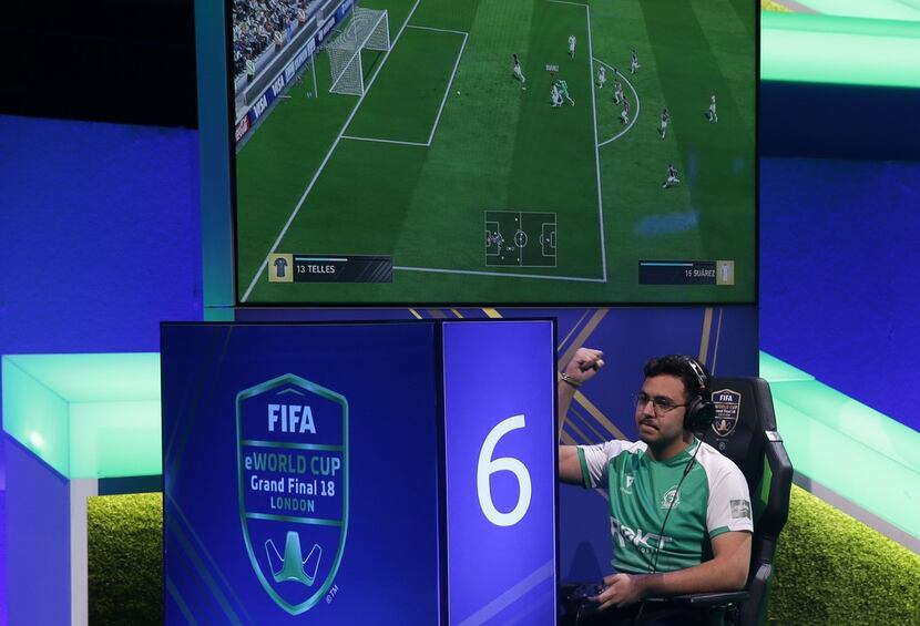 Player Mossad Aldossary competes in the group stages of the FIFA eWorld Cup Grand Final, at...