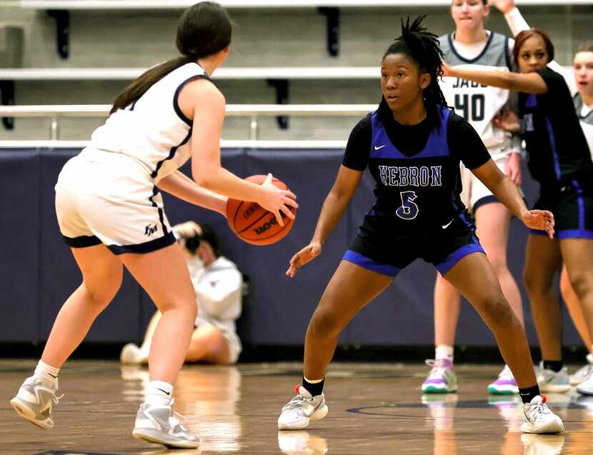 Hebron guard Sydnee Jones (5) tries to defend against Flower Mound on January 10, 2023 at...