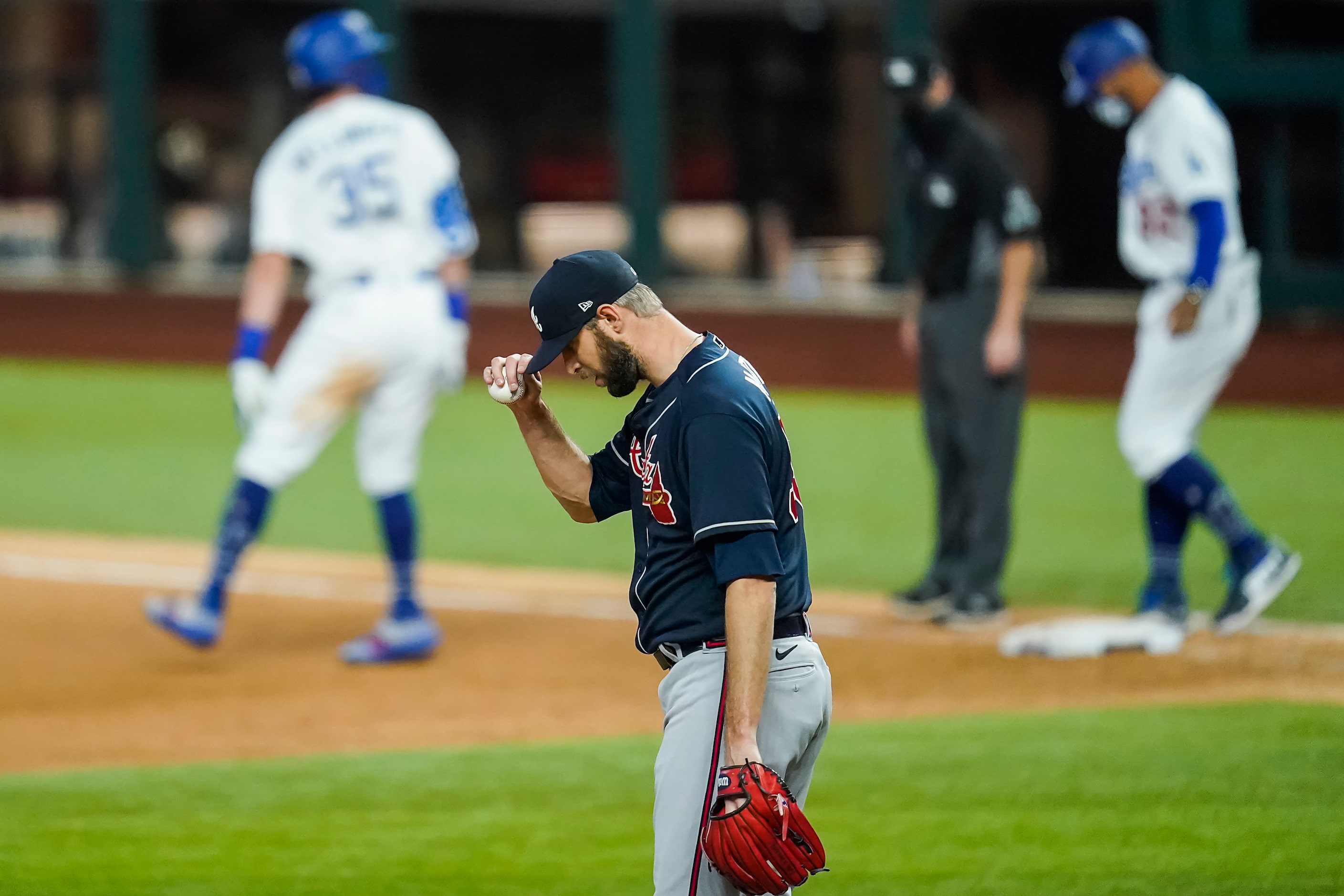 Atlanta Braves relief pitcher Chris Martin reacts as Los Angeles Dodgers center fielder Cody...