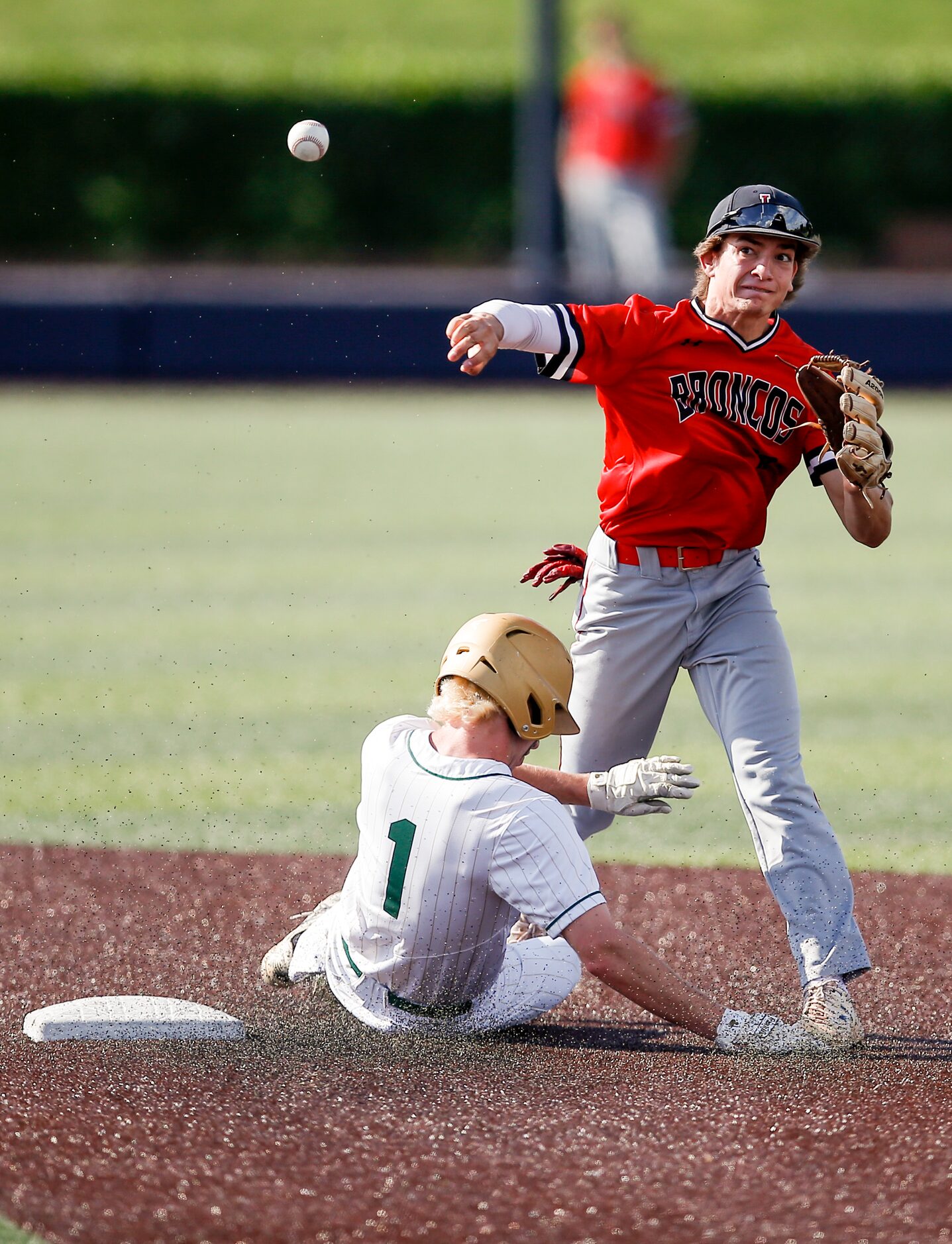 Mansfield Legacy’s Zein Daaboul (12) throws to first to force out Birdville’s Alex Showalter...