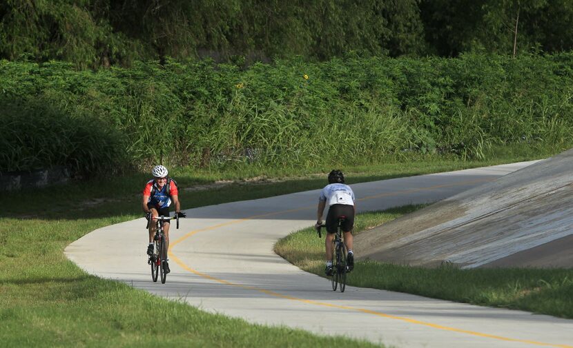  TI electrical design engineer Dave Parks bikes to work from his home in Dallas, Texas on...