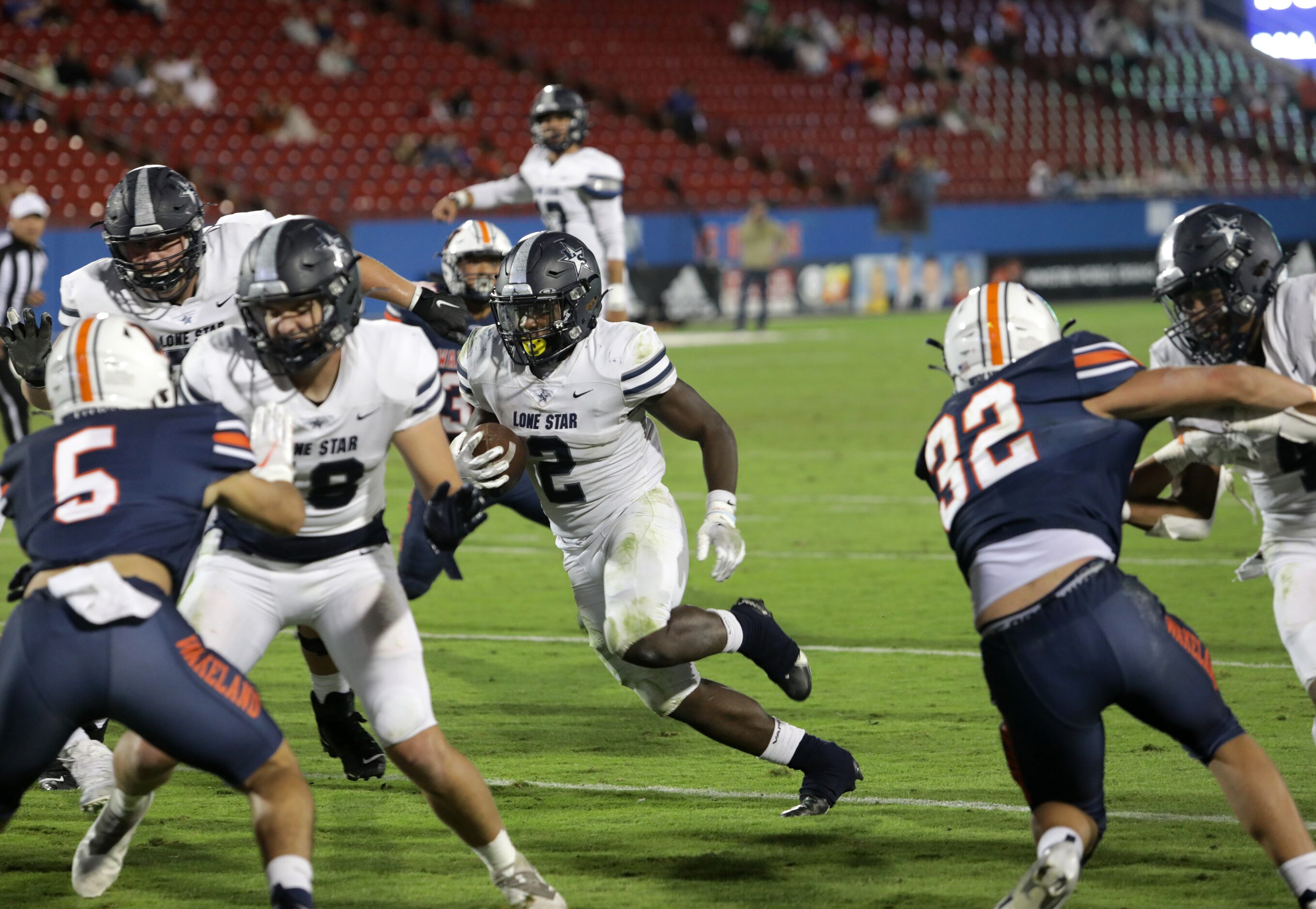 Lone Star player #2, Ashton Jeanty, finds a pocket as he runs for a touchdown during a...