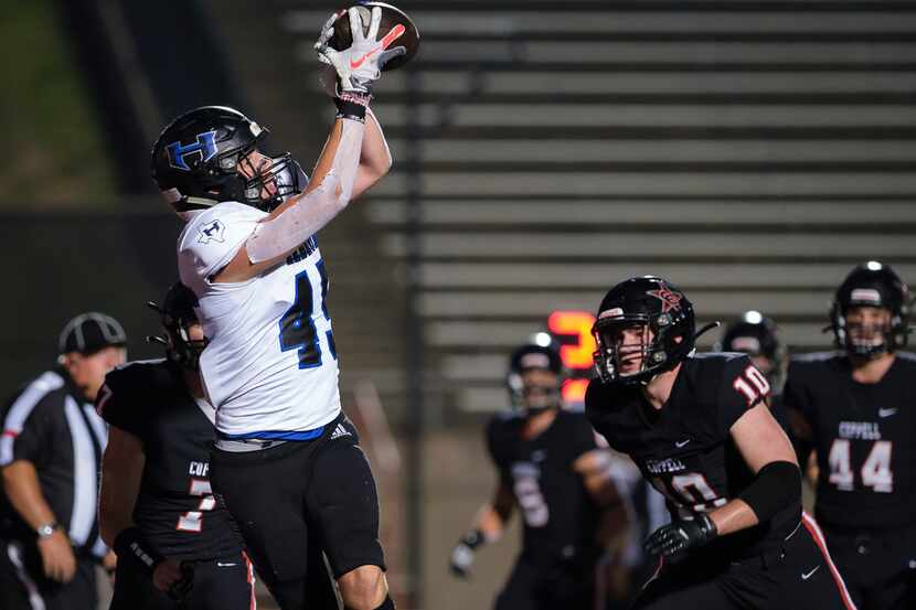 Hebron tight end  Ben Rutherford (45) catches a touchdown pass as Coppell defensive back...