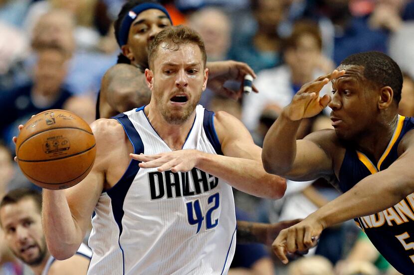 Dallas Mavericks forward David Lee (42) fights off Indiana Pacers forward Lavoy Allen during...