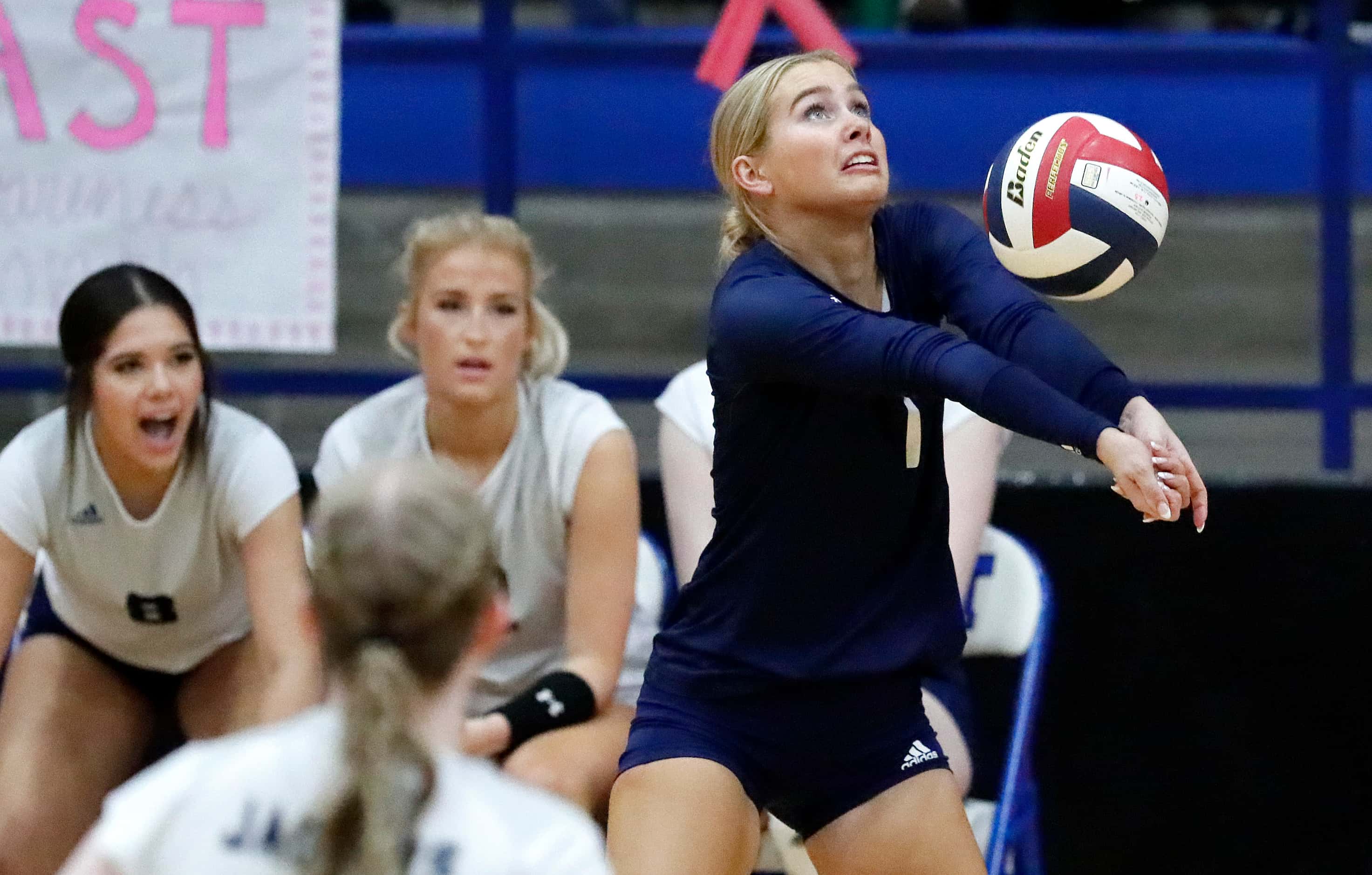 Flower Mound High School liber Emerson Dement (1) makes a set during game one as Plano West...