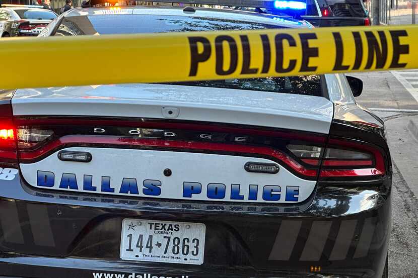 Police tape surrounds a crime scene in downtown Dallas on April 23, 2023.