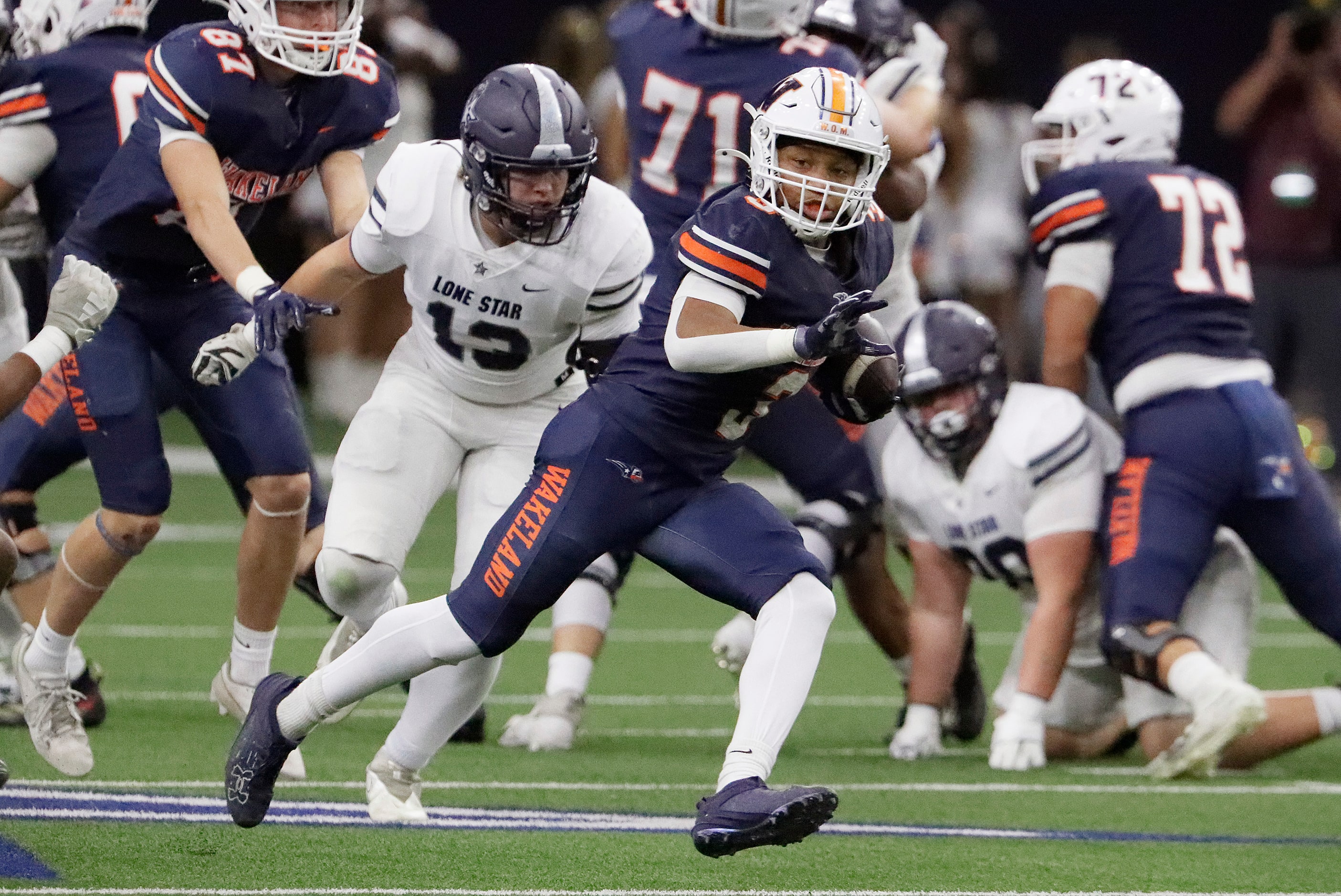 Wakeland High School running back Aidan Poole (3) runs for a touchdown during the first half...