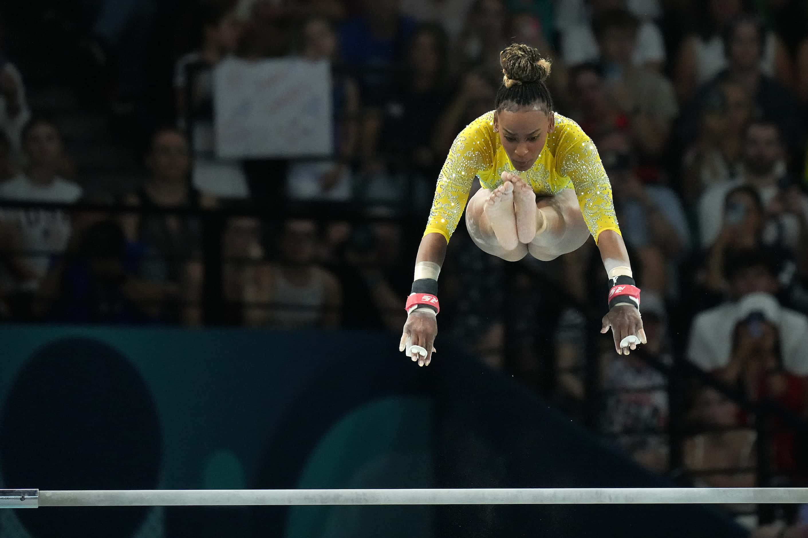 Rebeca Andrade of Brazil competes on the uneven bars during the women’s gymnastics...
