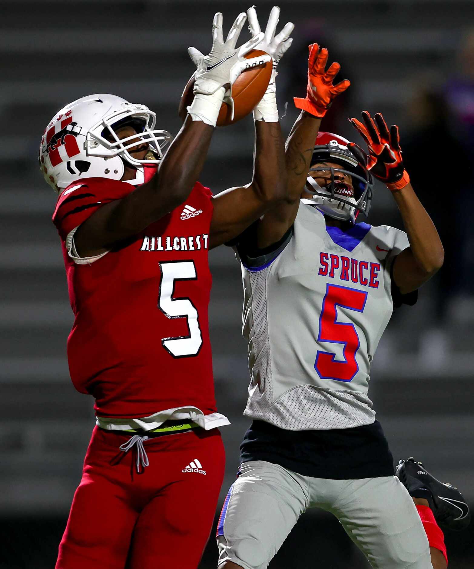 Hillcrest wide receiver Shannon Cruse (5) comes up with a 30 yard touchdown reception...