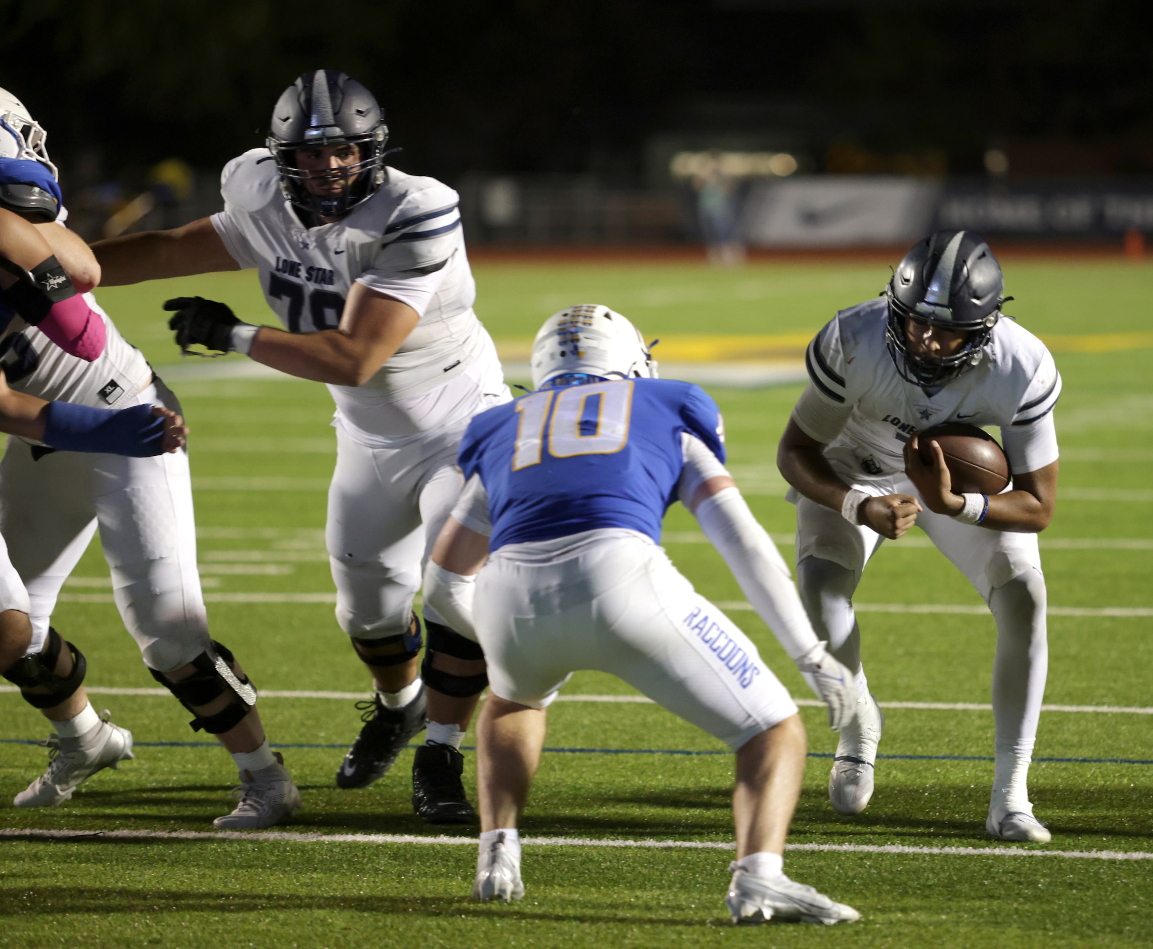 Lone Star player #7 Karece Hoyt attempts a quarterback sneak during the Frisco Lone Star...