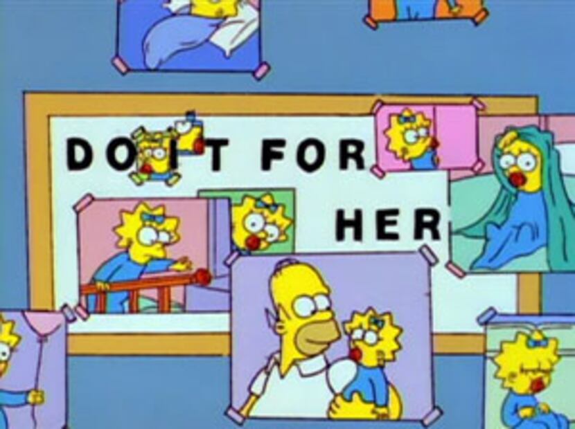 To inspire him, Homer used pictures of Maggie to alter a plaque at the Springfield power...
