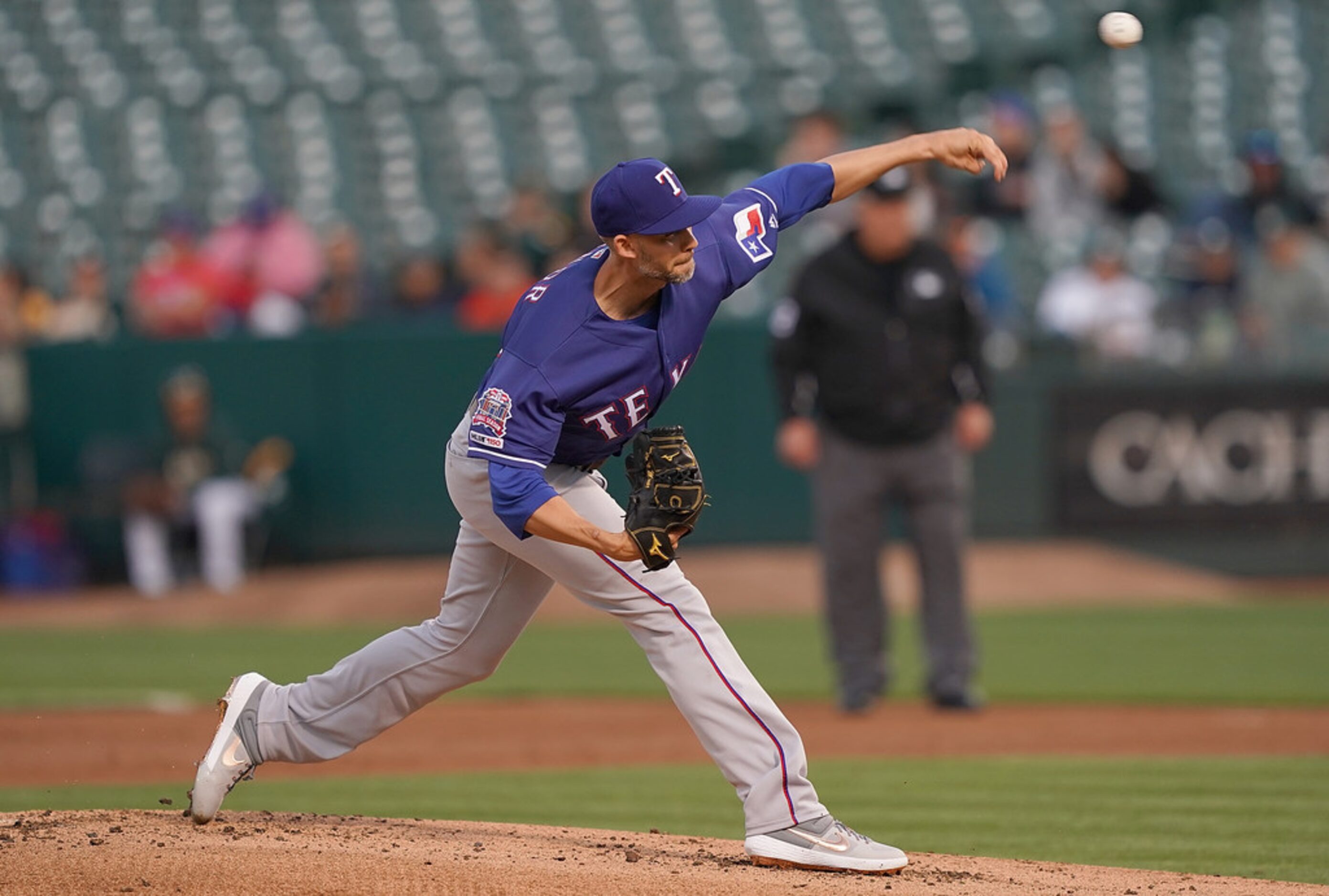 OAKLAND, CA - APRIL 22:  Mike Minor #23 of the Texas Rangers pitches against the Oakland...