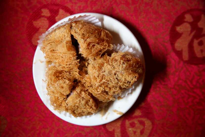 These fried taro balls at Kirin Court have been snipped in half for easy sharing. 