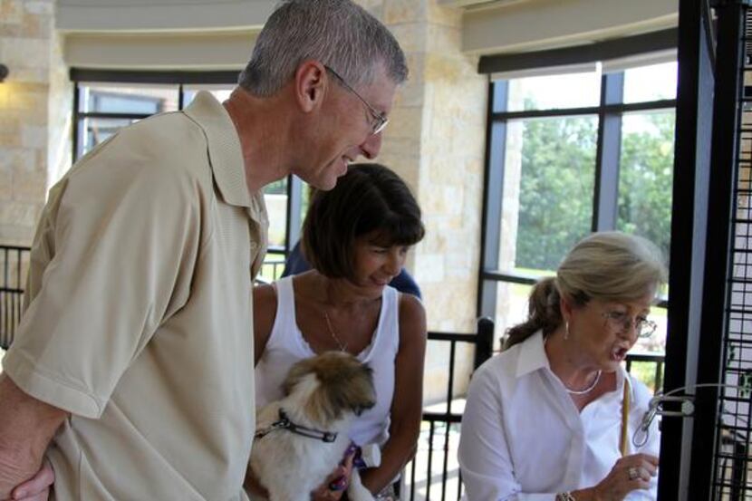 
City manager Claude King takes a look around at the grand opening of the Lewisville animal...