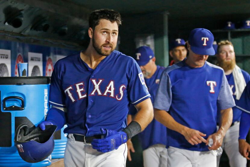 Texas Rangers third baseman Joey Gallo (13) is pictured in the dugout after hitting a home...