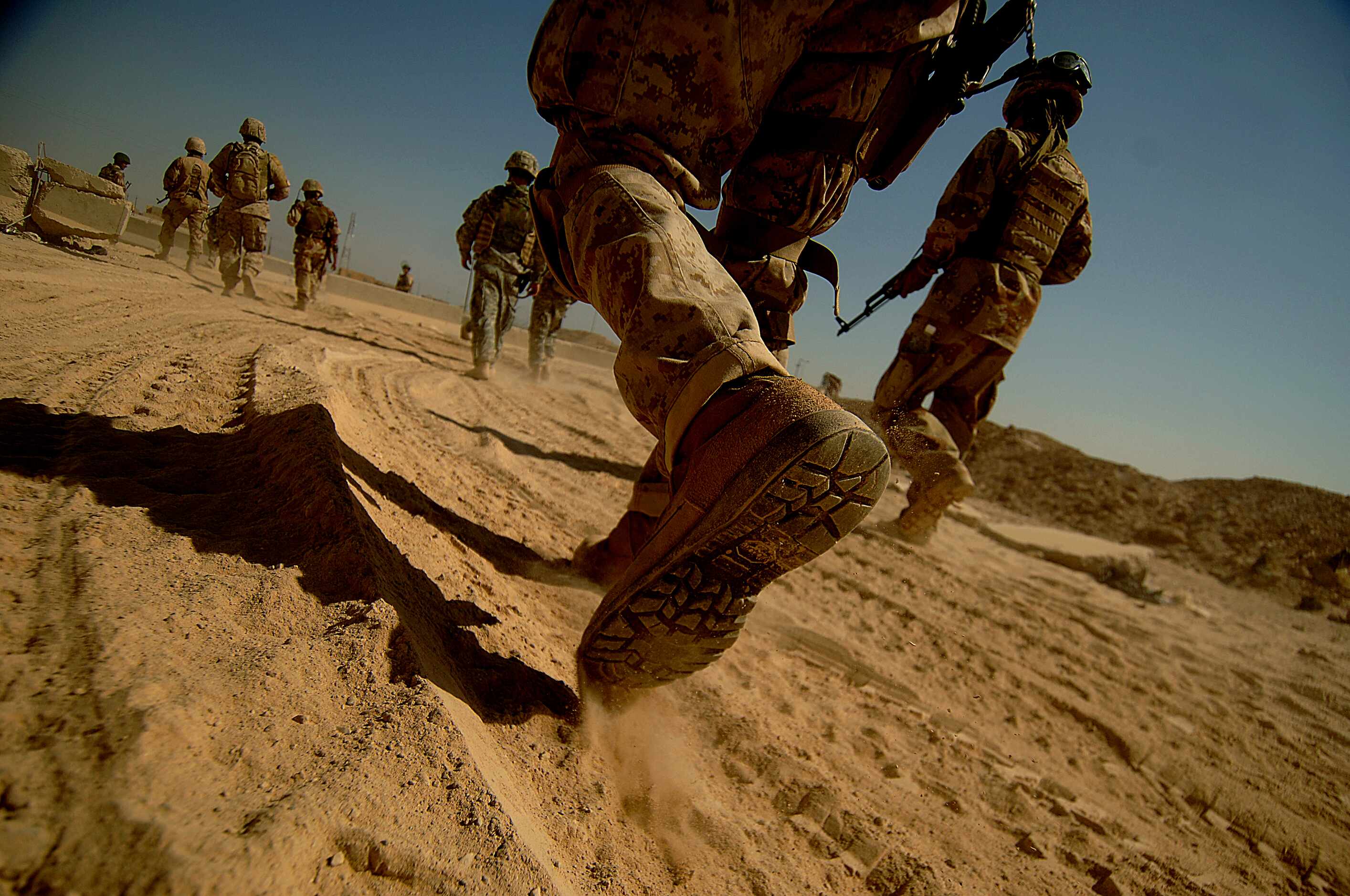 USMC CPT Jeff Tennen from MTT 10, 1-1-7 Iraq Army heads out on a joint foot patrol with the...