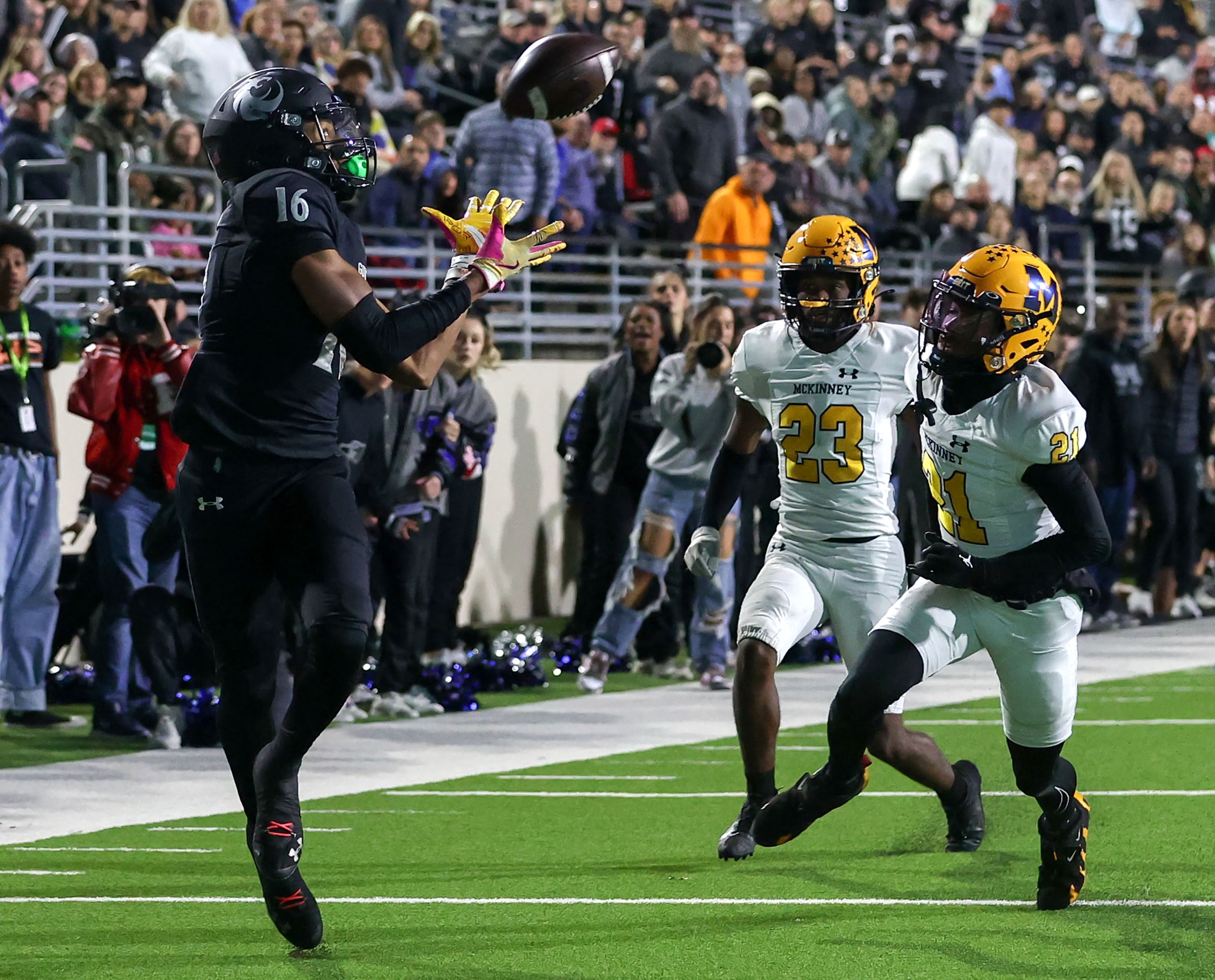 Denton Guyer wide receiver Mason White (16) comes up with a 34 yard touchdown reception...