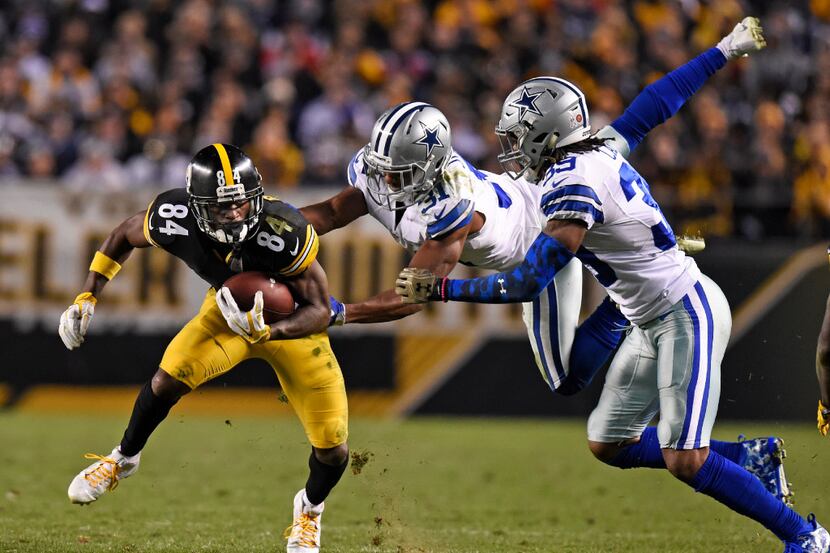 Pittsburgh Steelers wide receiver Antonio Brown (84) is tackled by Dallas Cowboys free...