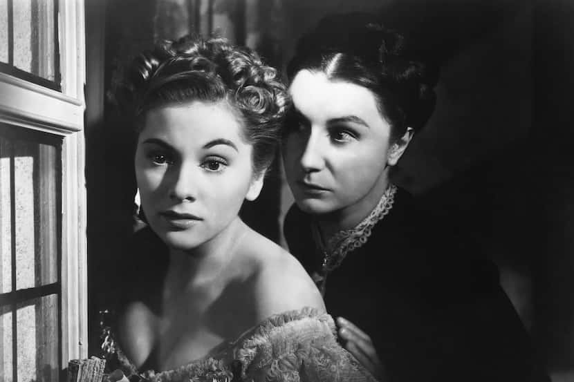 Don't mess with Mrs. Danvers: Judith Anderson loom over Joan Fontaine in "Rebecca." 