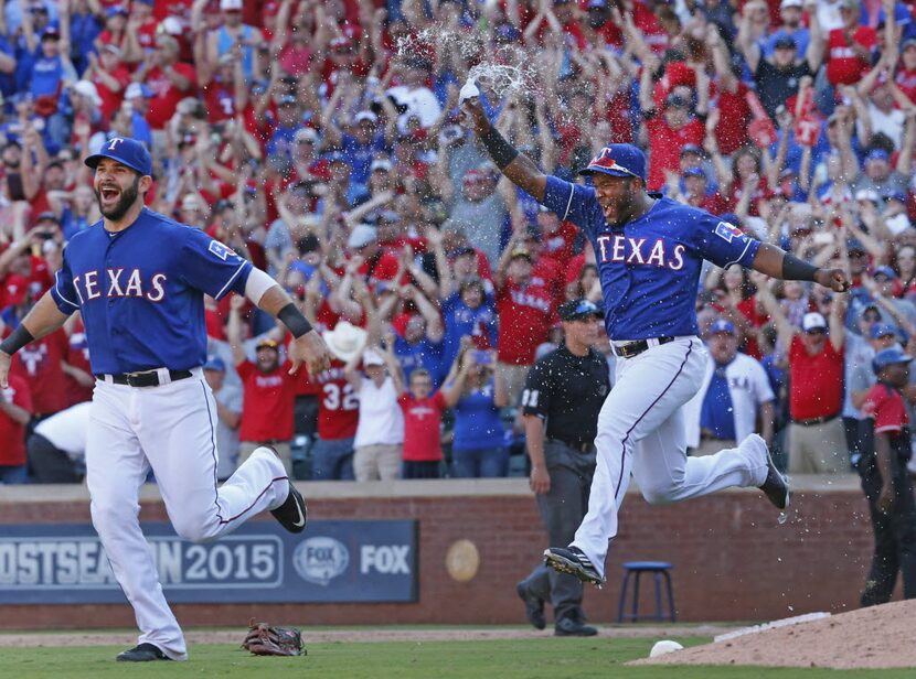 Texas Rangers first baseman Mitch Moreland, left, and infielder Hanser Alberto, right,...