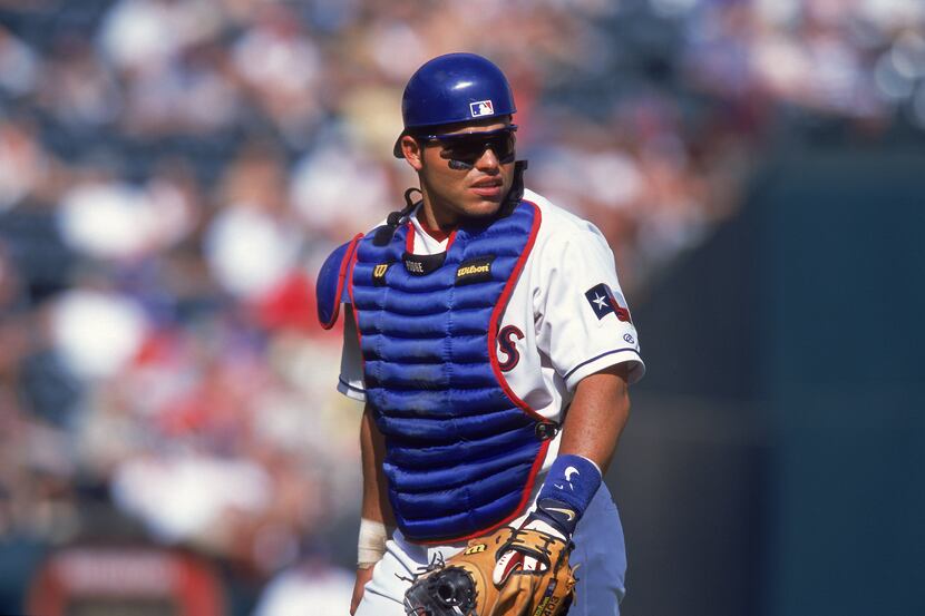 20 May 2001:  Ivan Rodriguez #7 of the Texas Rangers walks back to the plate during the game...