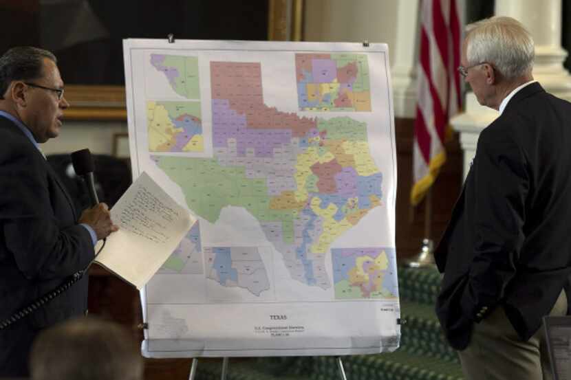 State Sens. Jose Rodriguez (left) and Steve Ogden examined a congressional district map...