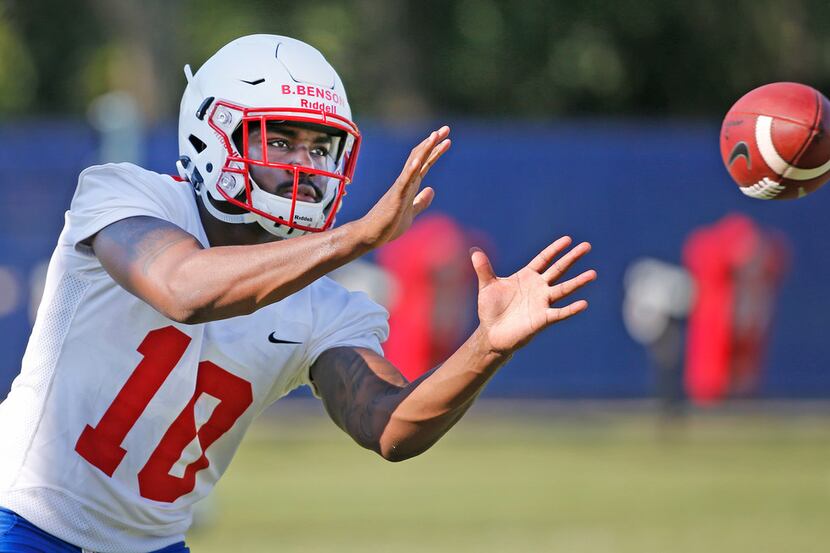 SMU receiver Brandon Benson (10) catches a pass during SMU football practice on campus in...