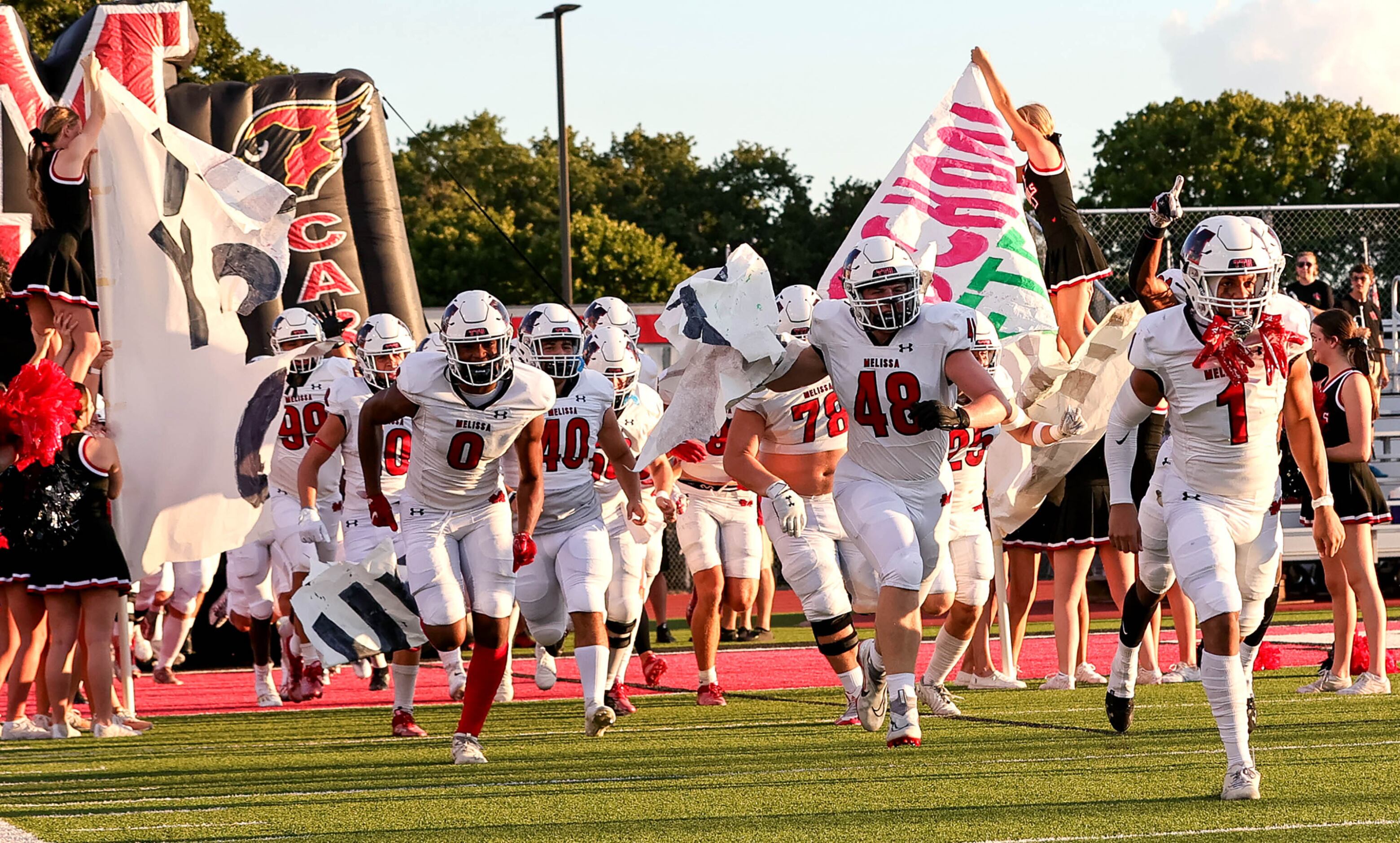 The Melissa Cardinal enter the field to face Argyle in a high school football game played on...