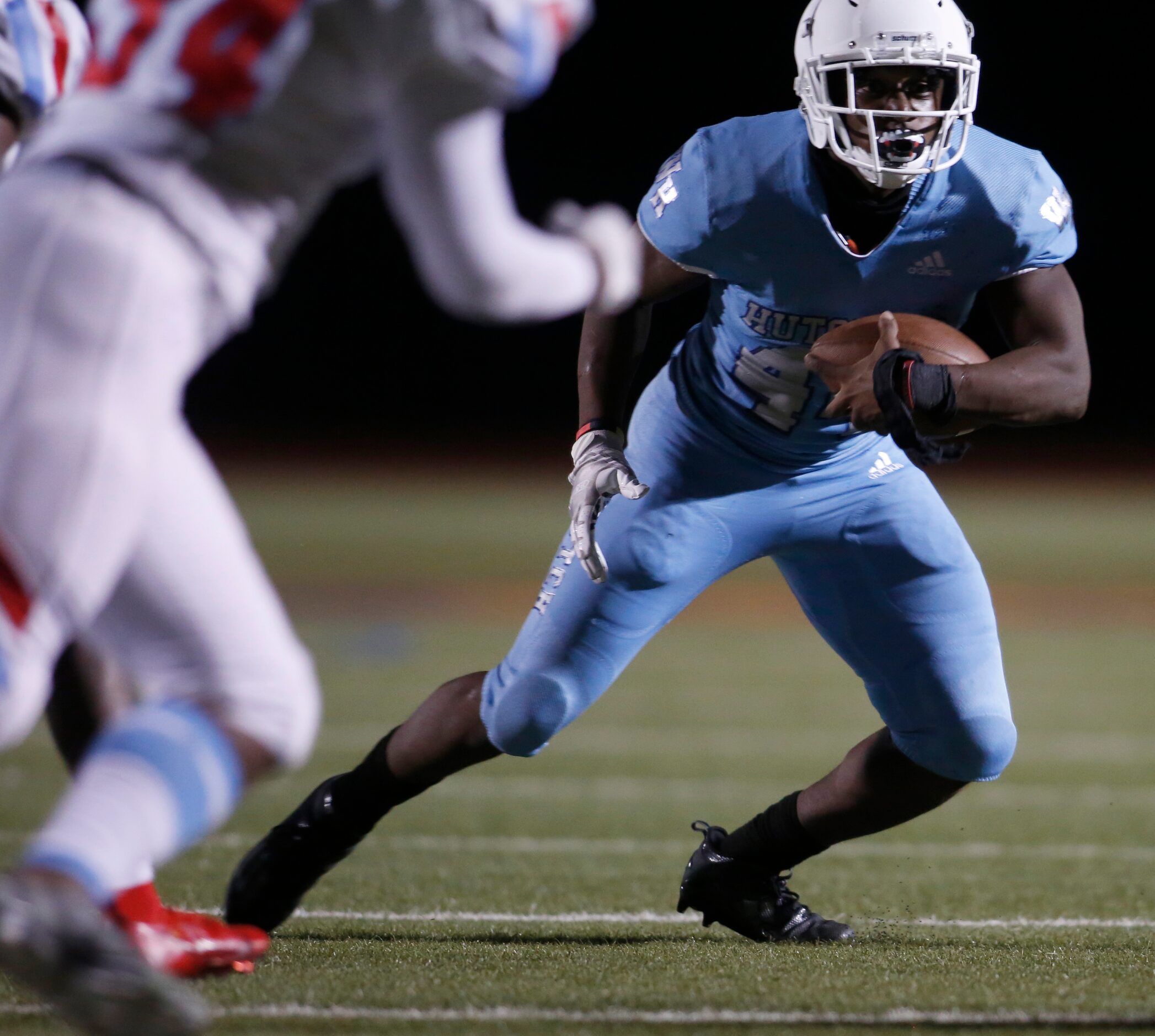 Wilmer Hutchins running back Billy Monroe, lll (44) looks for running room out of the...