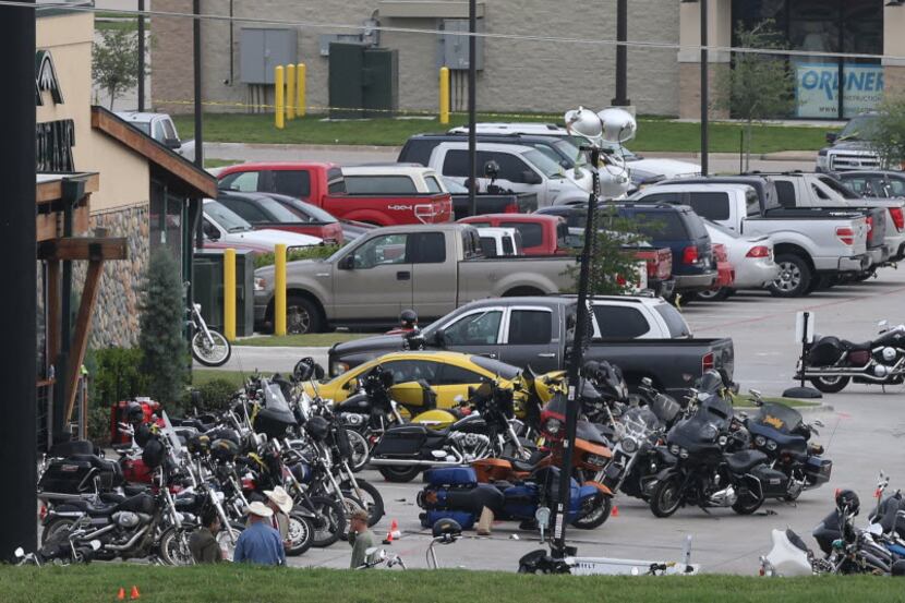  Law enforcement continue to investigate the motorcycle gang related shooting at the Twin...