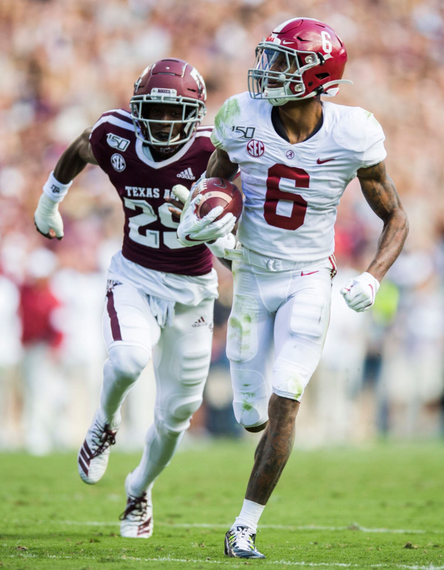 Texas A&M Aggies defensive back Debione Renfro (29) tries to catch up with Alabama Crimson...