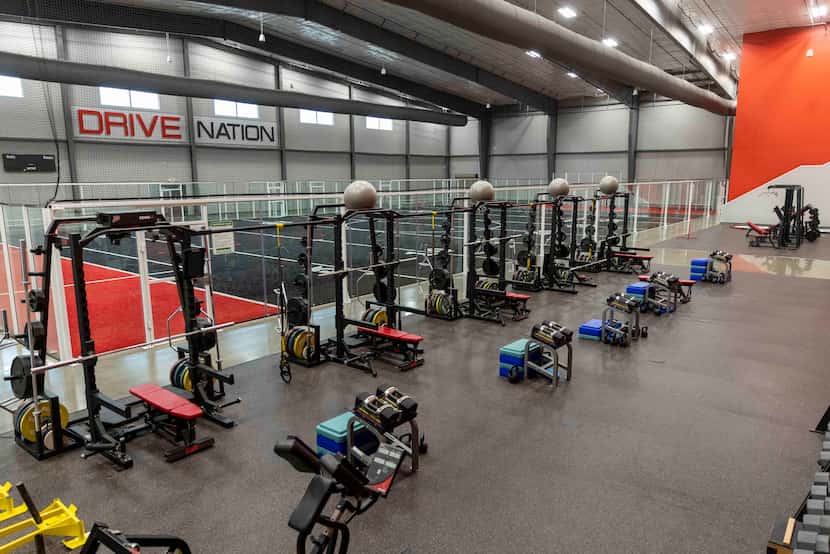 A view of a turf field and gym equipment at Drive Nation Sports in Dallas on Tuesday, Nov....